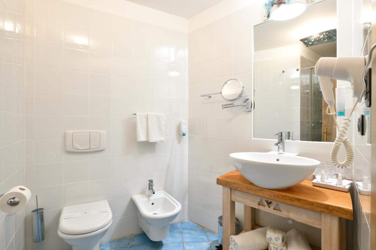 Hotel & Baia Caddinas