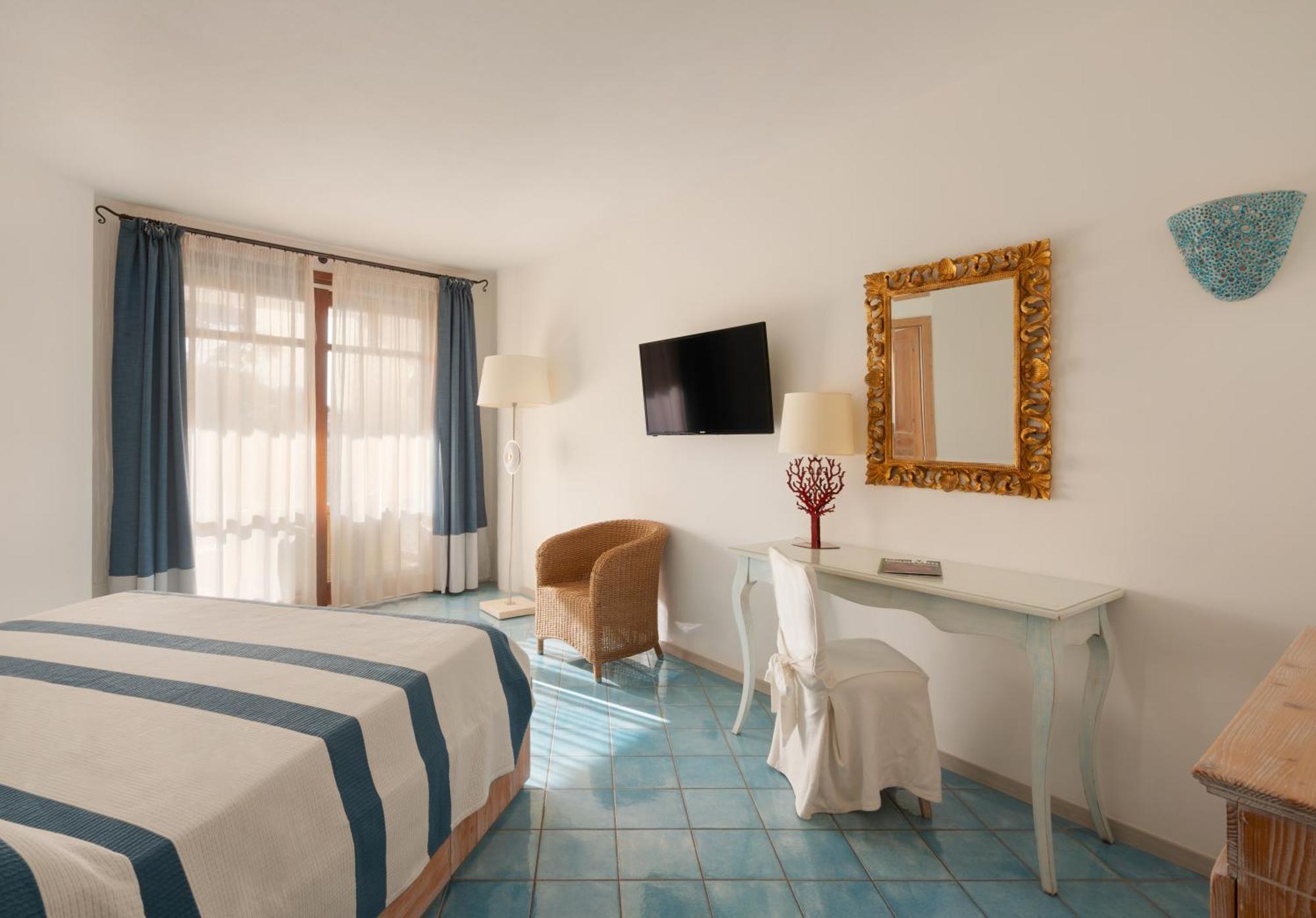 Hotel & Baia Caddinas